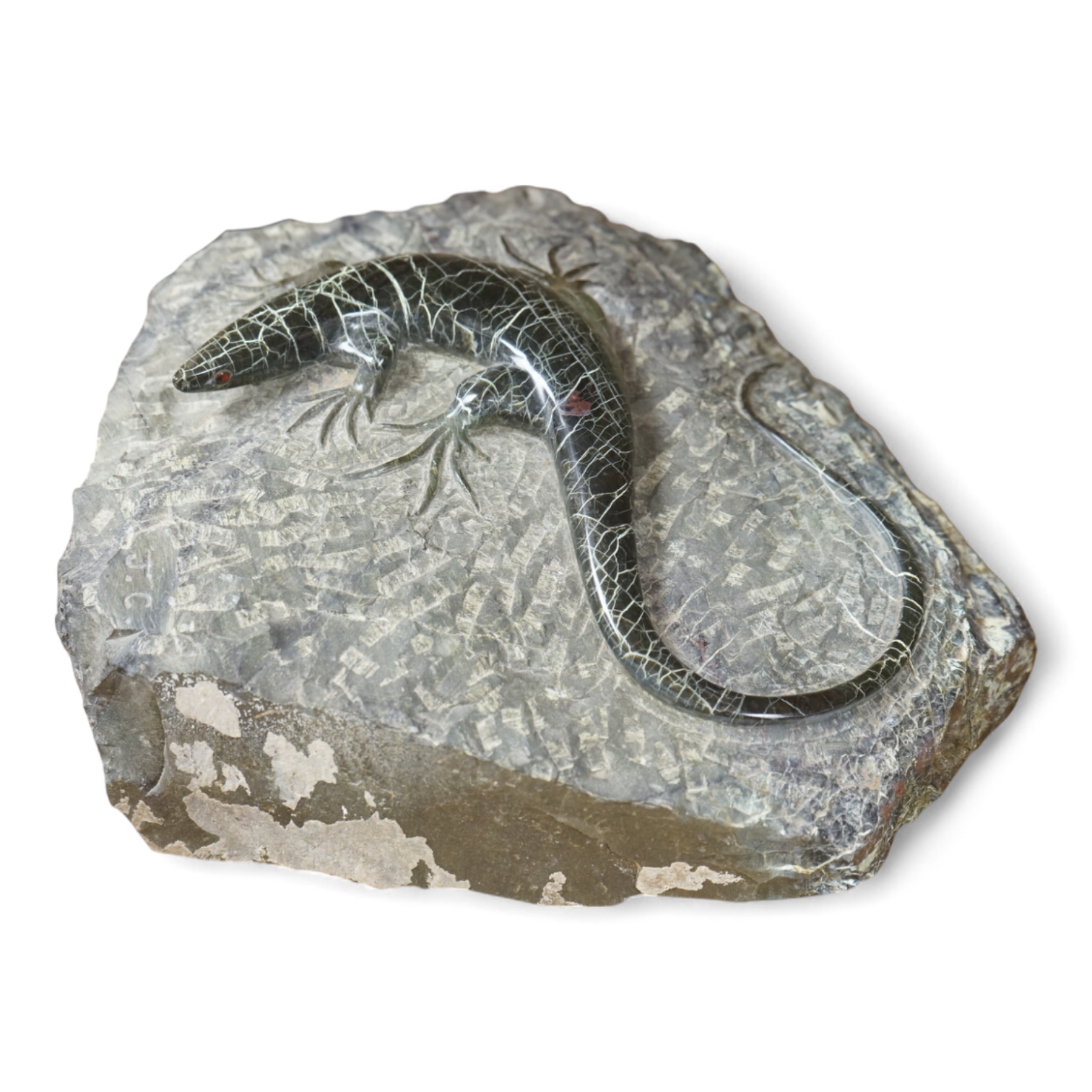 A carved green granite lizard, 27cm wide